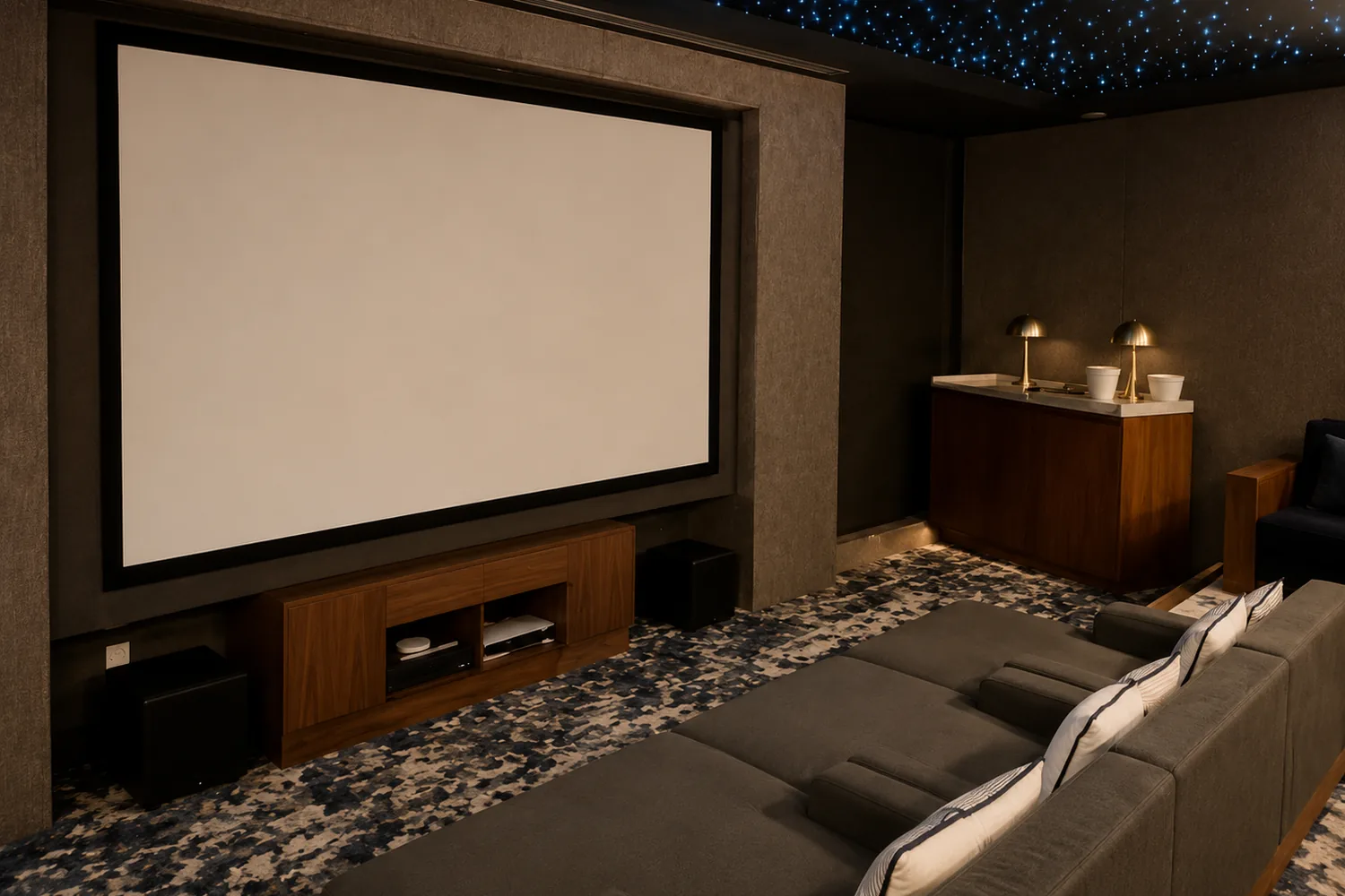 Dedicated cinema room with a large projection screen and fibre-optic starlit ceiling
